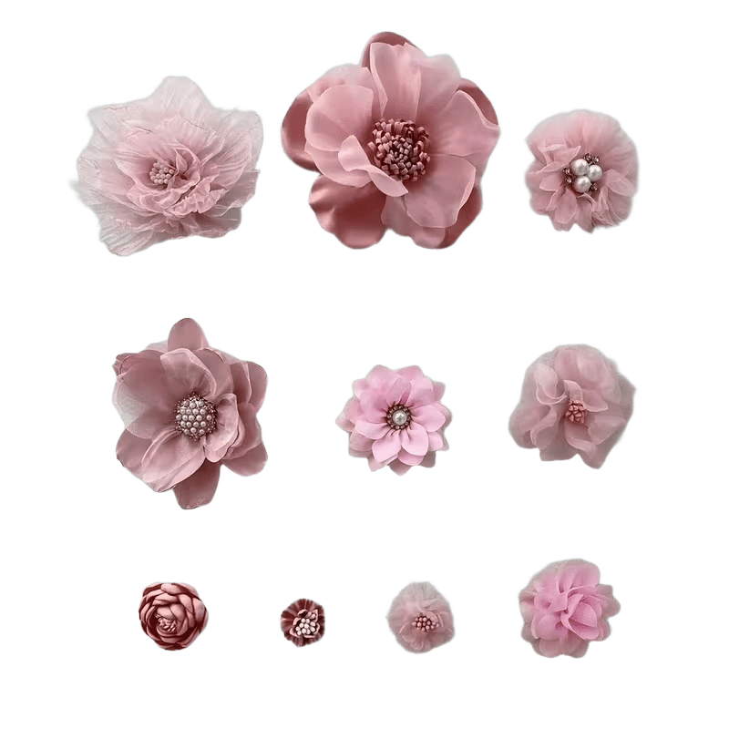 A product photo of pink fabric flowers (simulated decorative flowers) isolated on a clean pure white background, evenly lit, soft shadow, e-commerce style, high resolution.